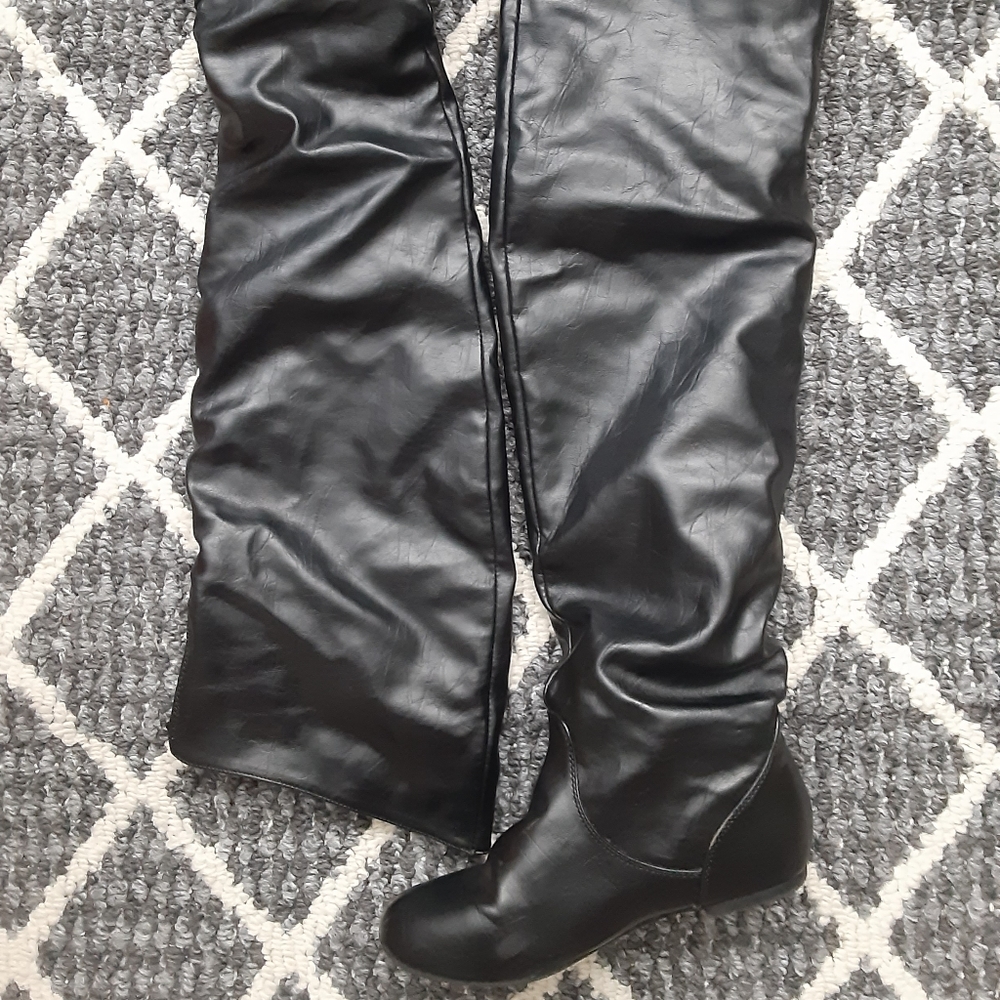 thigh high black boots